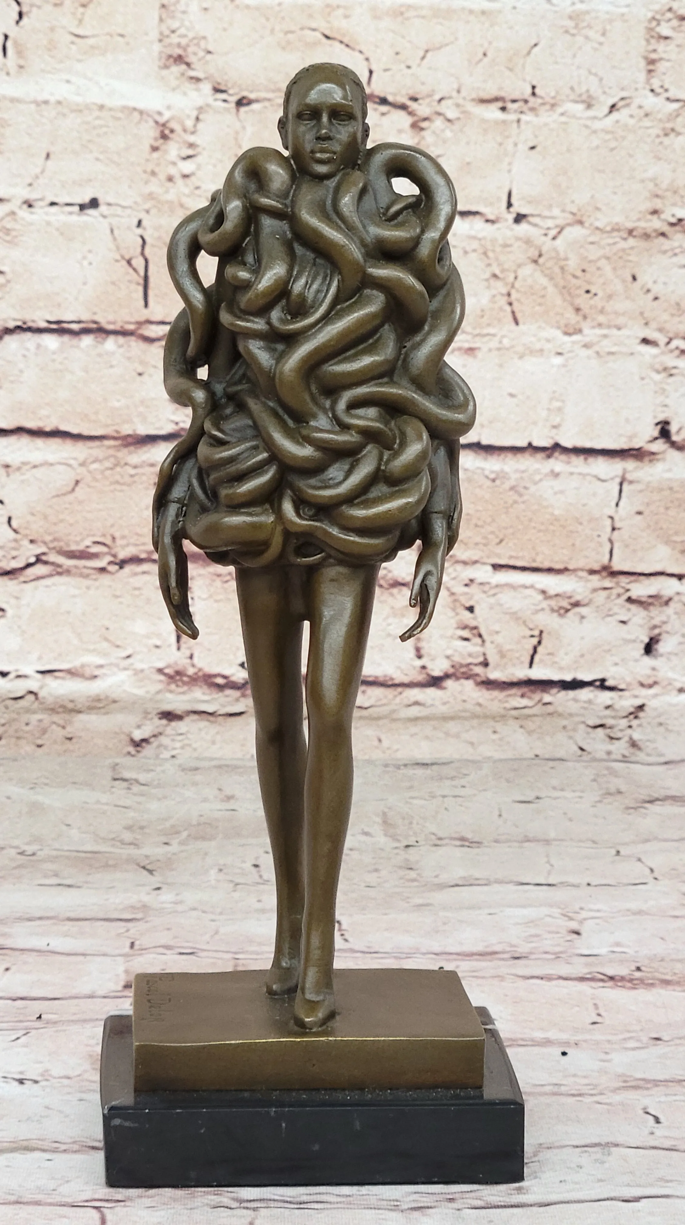 Contemporary Art Bronze Sculpture of Woman Wearing Snakes - Unwavering by Pascal Delor